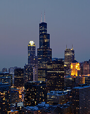 Night time skyline view of Chicago, Illinois | Turnkey FF&E & Interiors | The Living Company | Garland, Texas