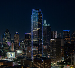Night time skyline view of Dallas, Texas | Turnkey FF&E & Interiors | The Living Company | Garland, Texas