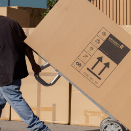 Student housing FF&E being moved by a professional installer | Turnkey FF&E & Interiors | The Living Company | Garland, Texas